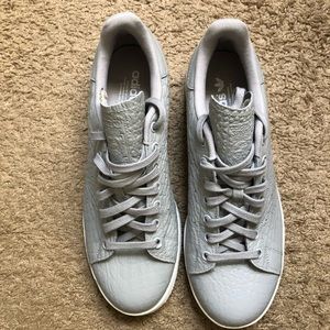 Gray and white Adidas man size (10.5)